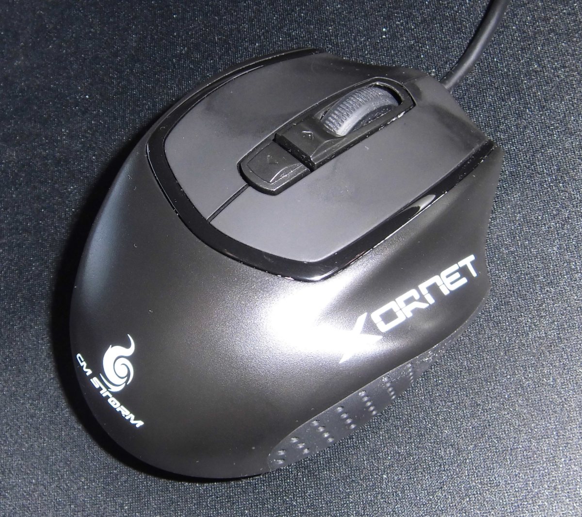 My CM Storm Xornet on a Roccat Taito mouse pad. The handy ring finger rest makes this mouse perfect for claw gripping.