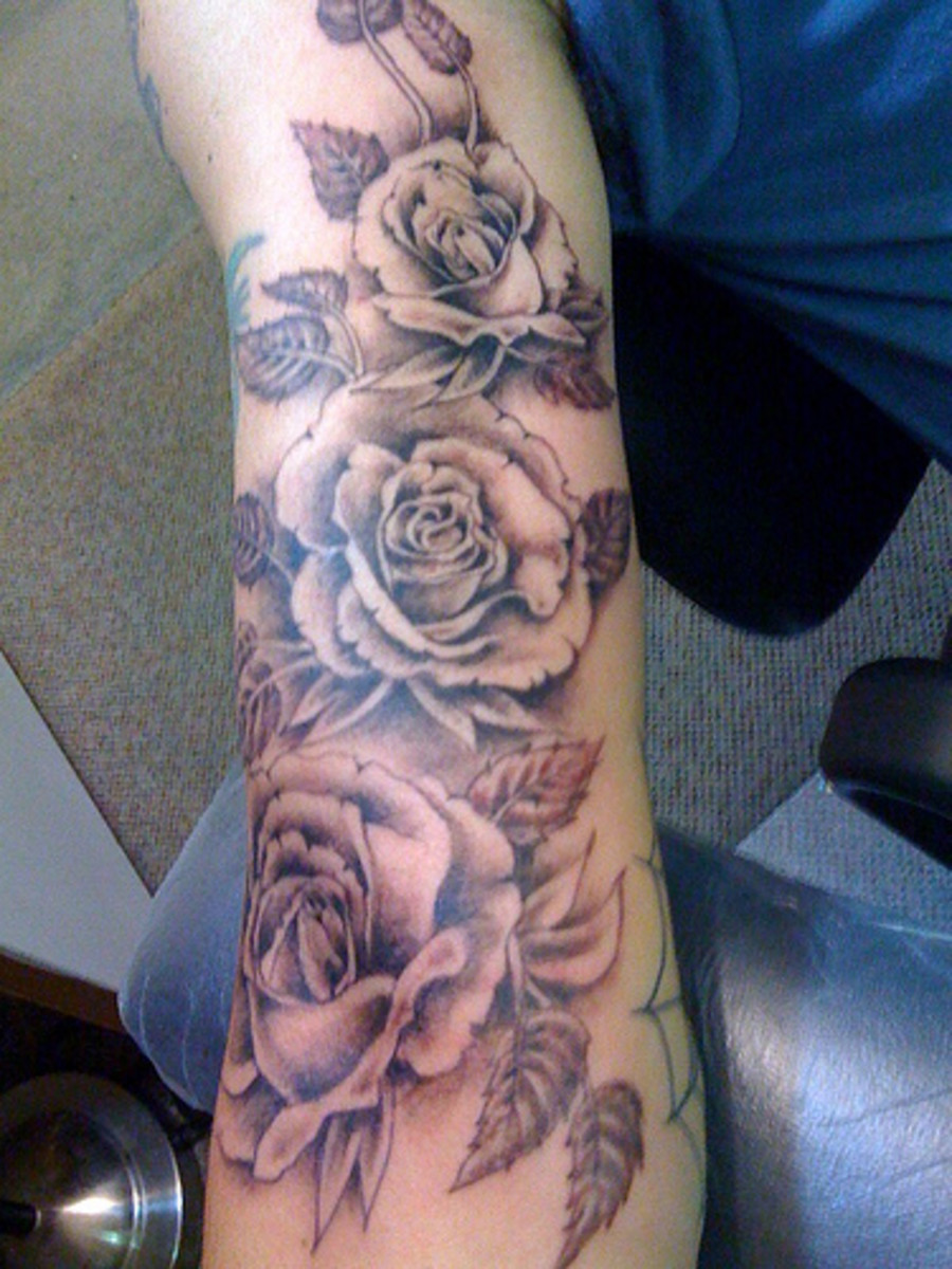 Rose tattoos on hand