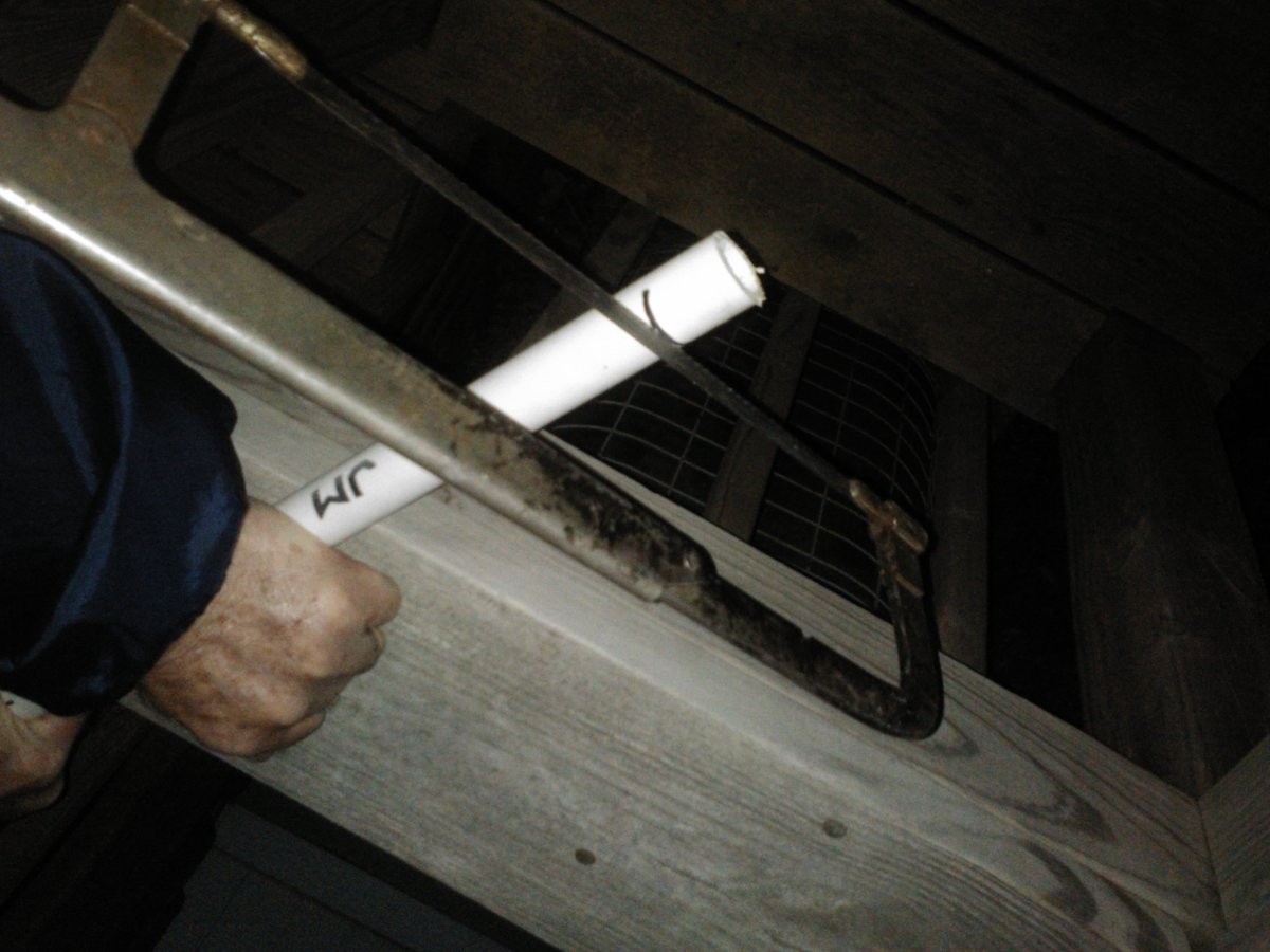 A simple way to trim the PVC pipe is with a hacksaw.