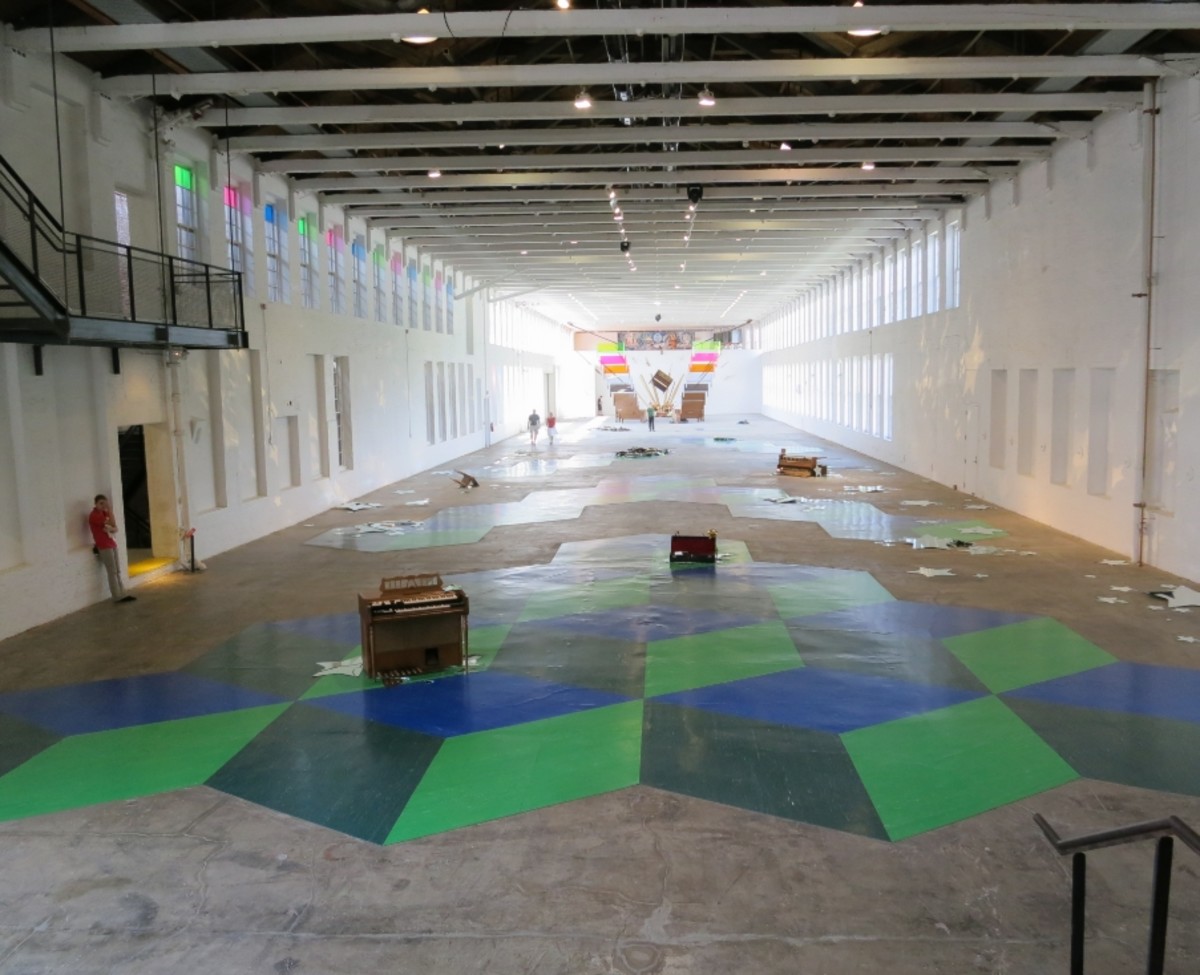 The Sanford Biggers installation occupies the large fottball field sized gallery