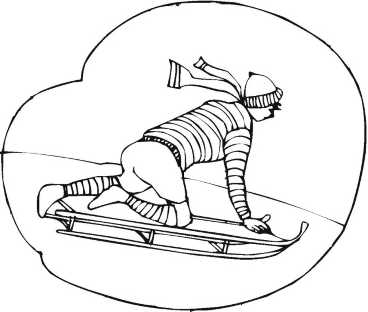 Boy sliding on sled with runners