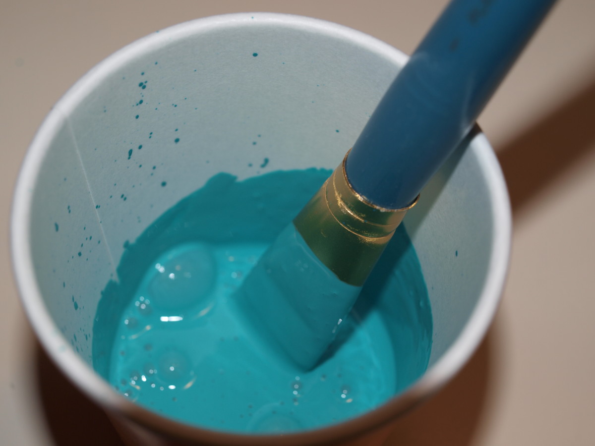 Figure 2 - Mix equal parts of paint and glue in paper cups.