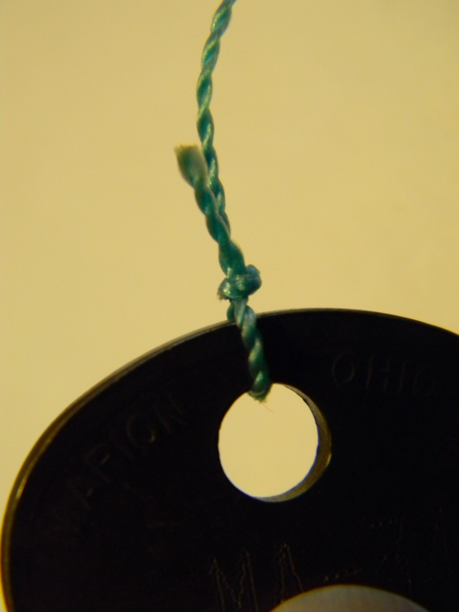 Tie strings to each key or other noisemaker.