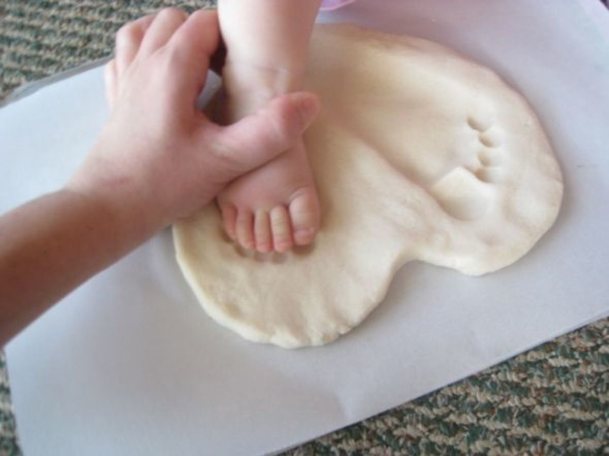 Adding a footprint to your salt dough heart. 