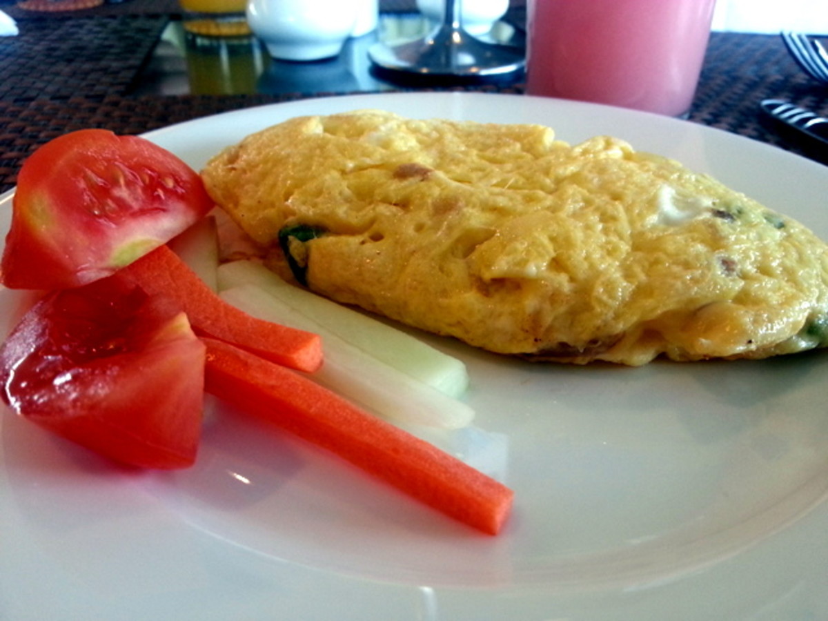 Picture of Egg omelet. There are many ways to serve omelet. Have it with a slice of bread of your choice for breakfast.
