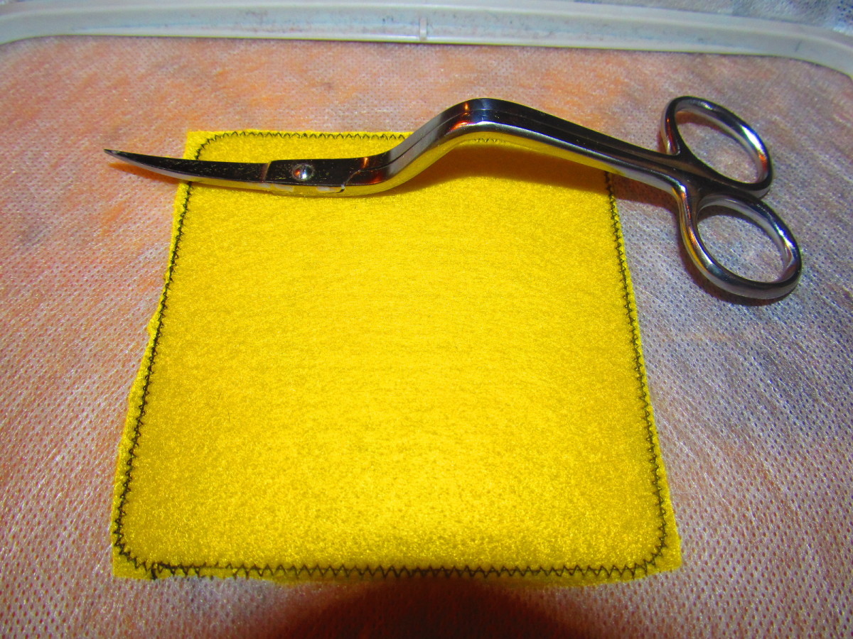 A nice clean trim of your fabric will leave less felt or fabric on the outside of the patch when you are done.