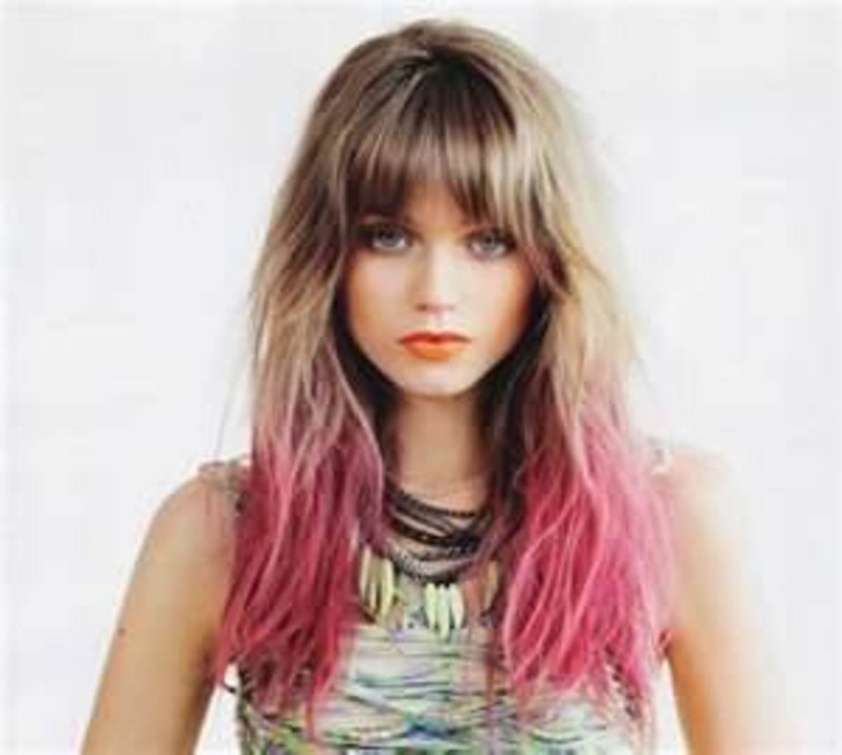 Pink ombre hair.