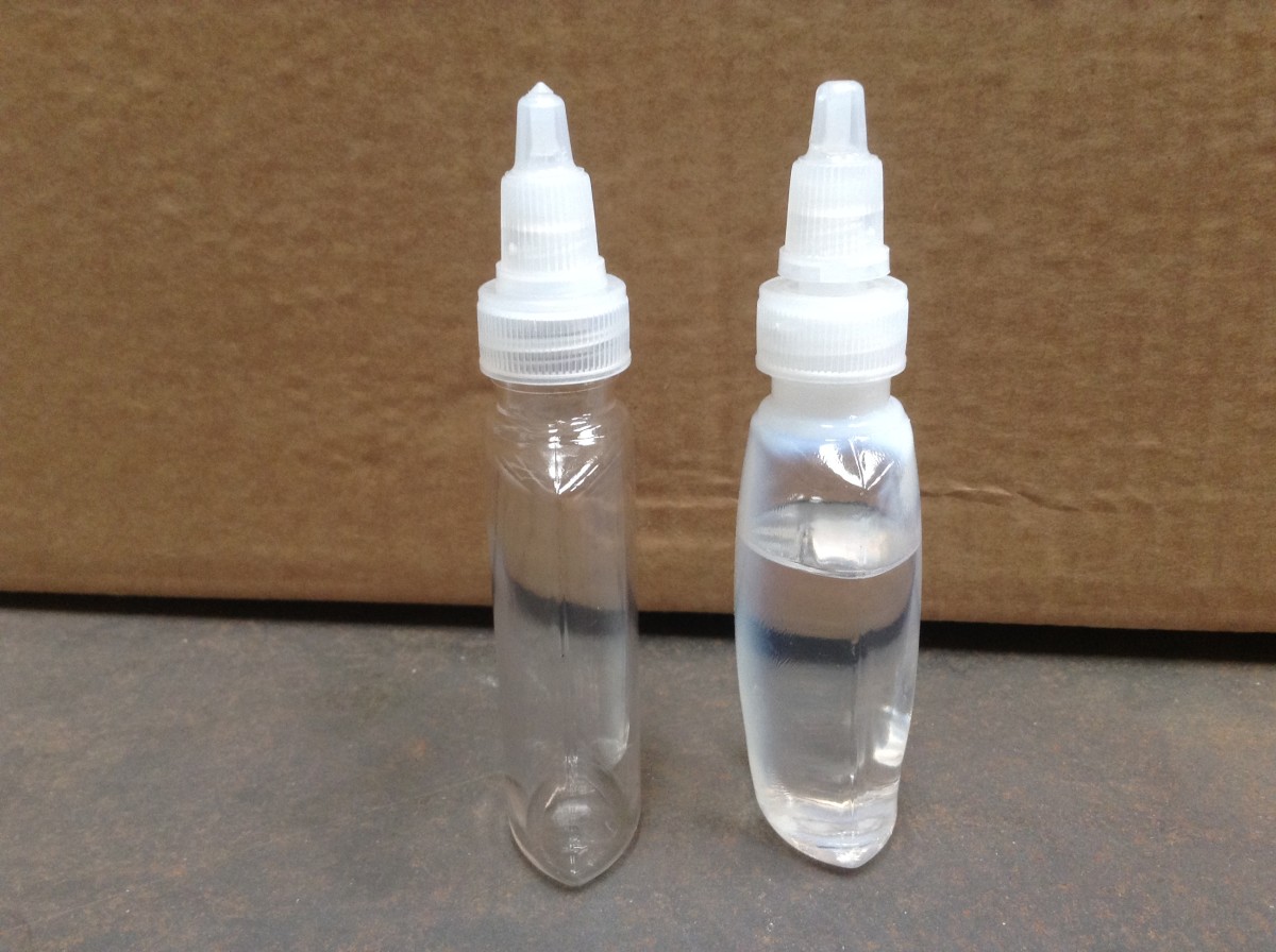 Bottle on the left with no product in it and bottle on the right with acetone in it.