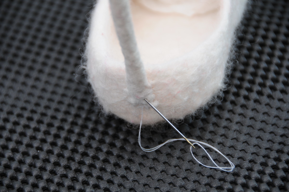 Sewing on with cotton thread