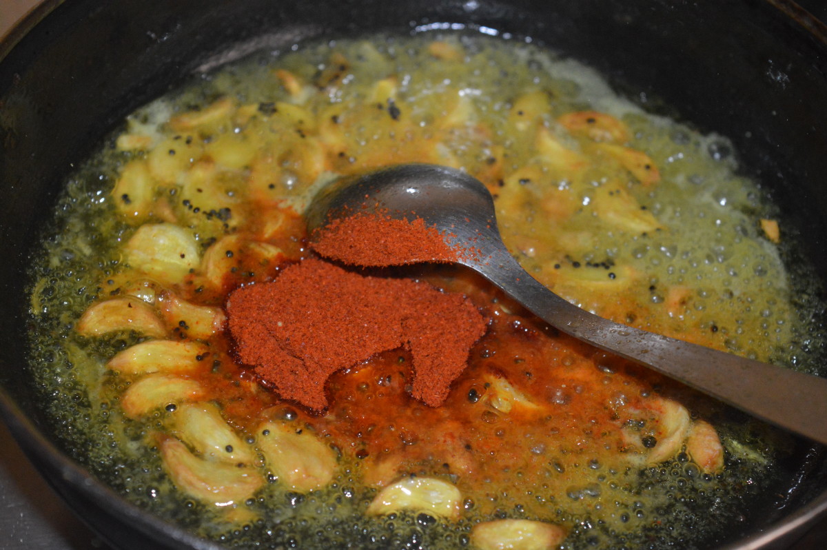 Add red chili powder. Mix well.