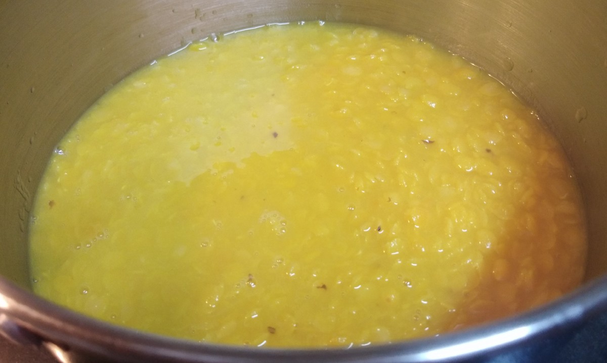 Transfer the mashed lentils to a vessel or pot and set aside.