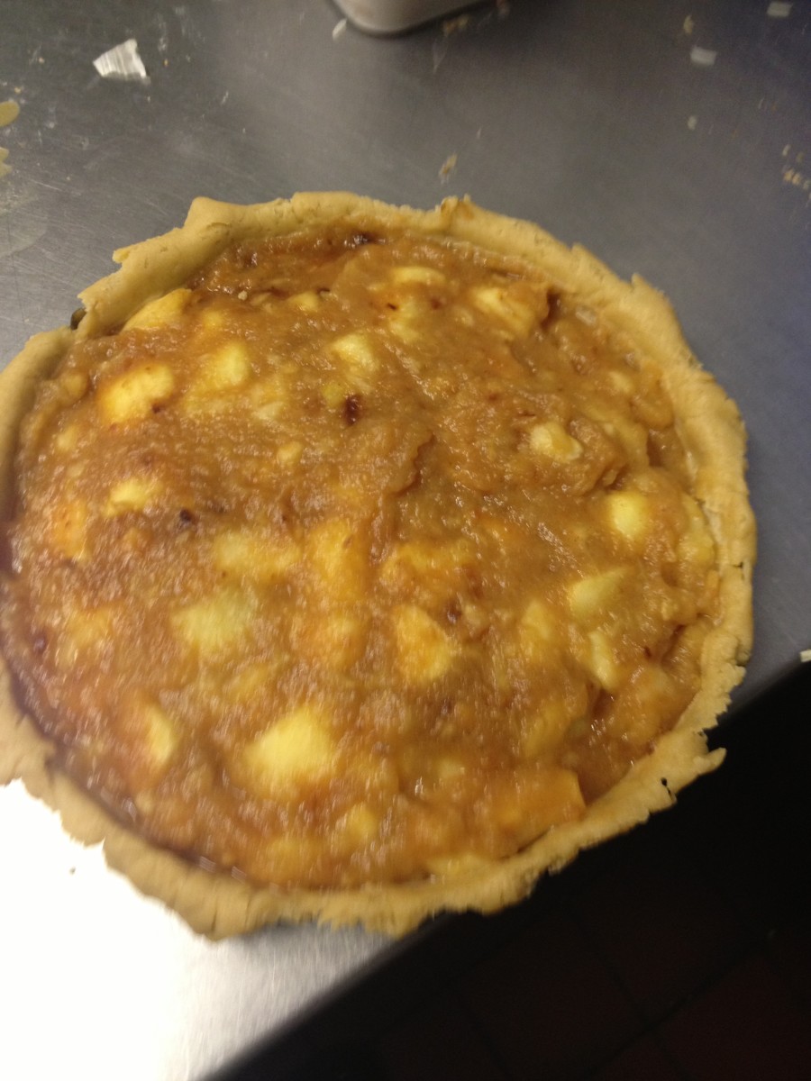 Bramley apple pie ready with apple filling ready for the top to go on. 