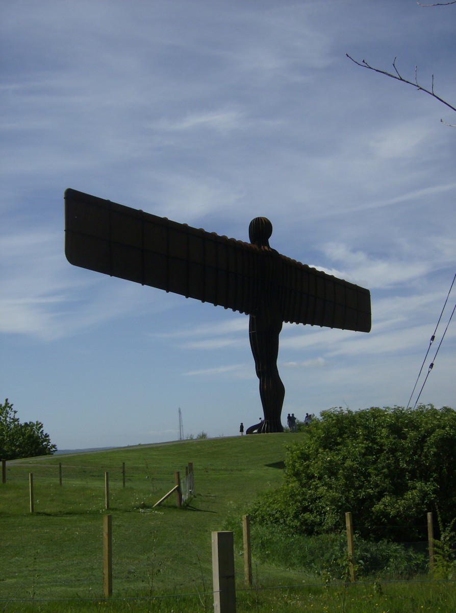 The Angel of the North viewed from the car park at the base of the hill. From behind it almost looks as if it is about to take flight.