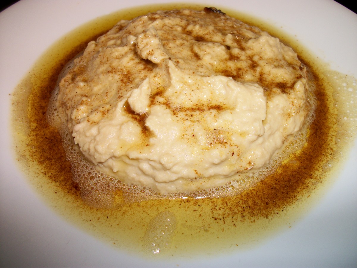 Hummus with cumin in olive oil