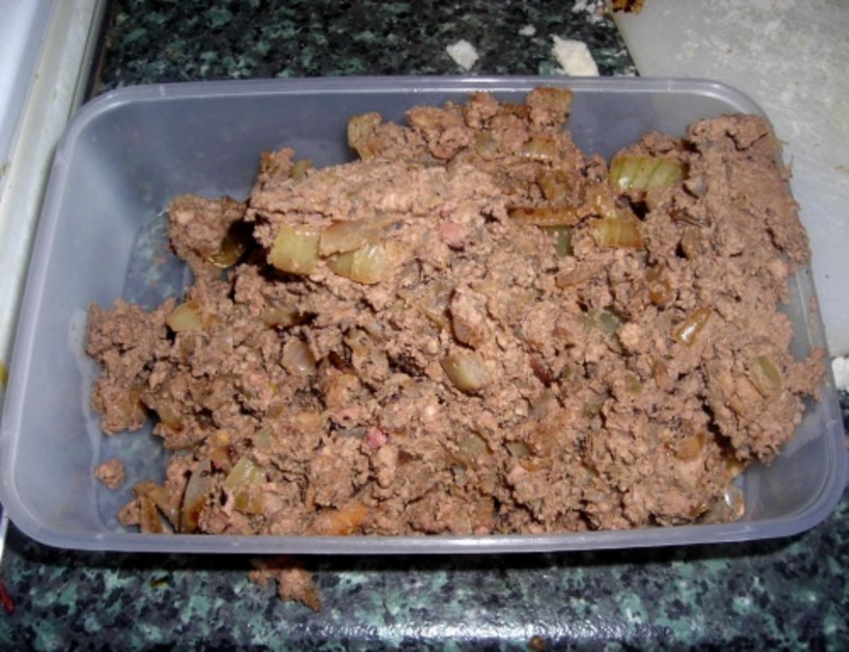 Tray full of cooked chicken liver after lightly blending, but before egg is added
