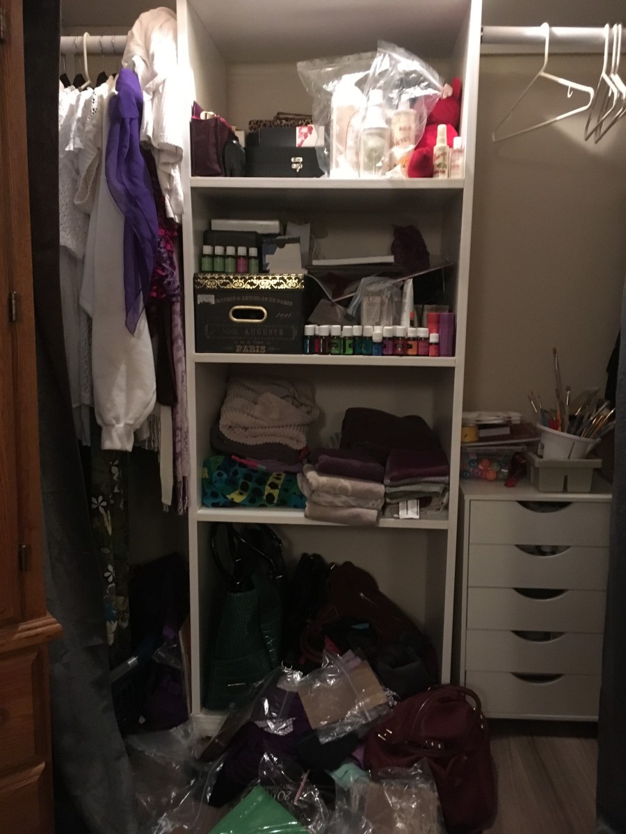 The Master bedroom closet before I De-clutter. It is also my craft and linen closet. 