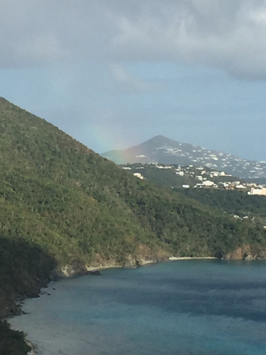 Lol, sneaky Rainbow, hiding behind the mountain, barely but got it, I call it the sneak peek. Captured February 17, 2018 @ 4:33pm.