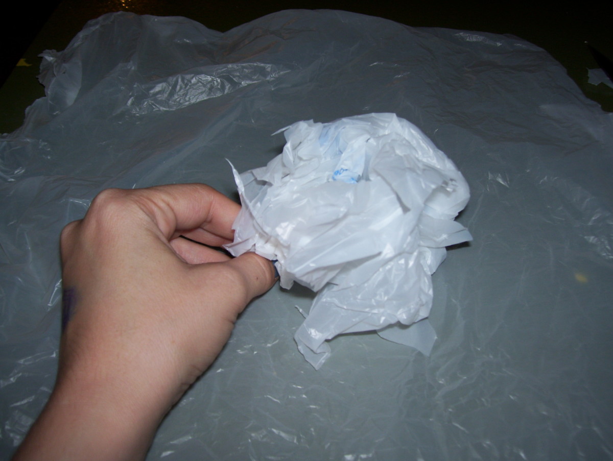 Plastic bag ghost--roll one side of the bag to make stuffing for the head