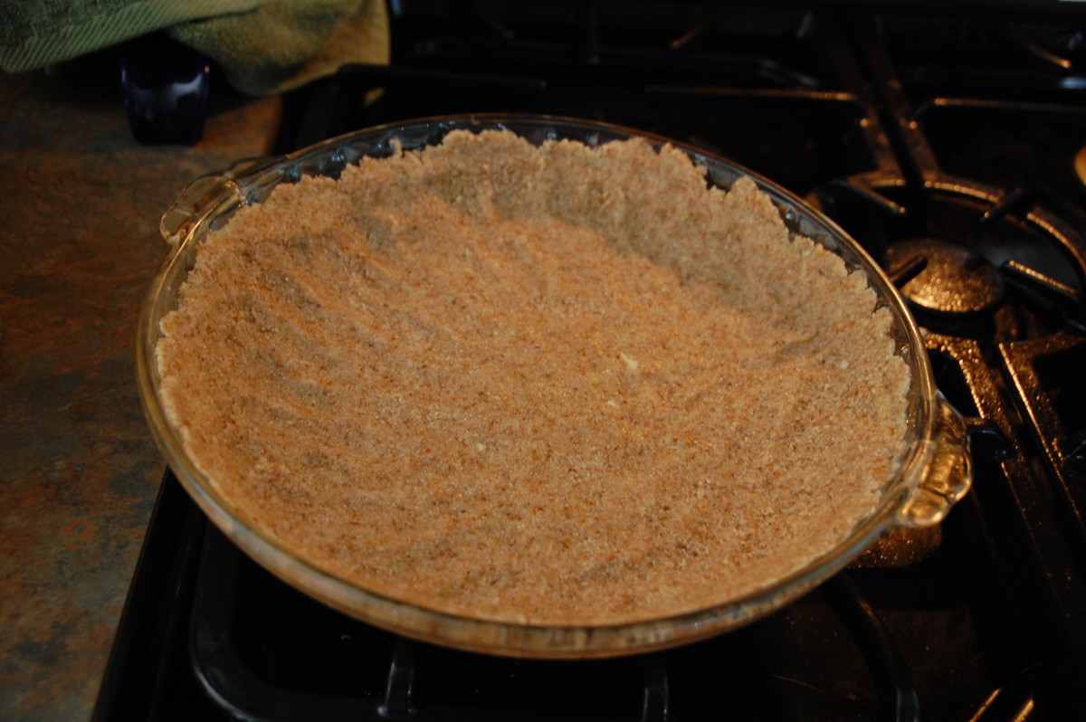Press the dough into the pie pan to form the crust