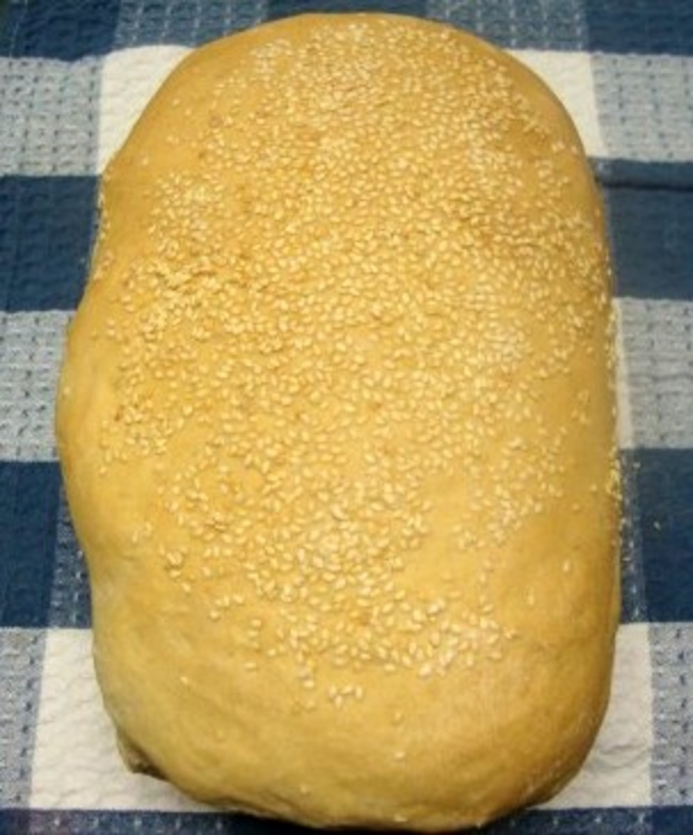 Bread topped with sesame seeds. The seeds develop a lovely toasted flavor as the bread bakes.