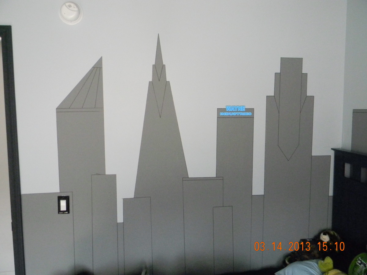 This is the finished Gotham City skyline with the detail lines drawn with a black Sharpie and the Wayne Industries sign attached with DIF wallcovering adhesive.