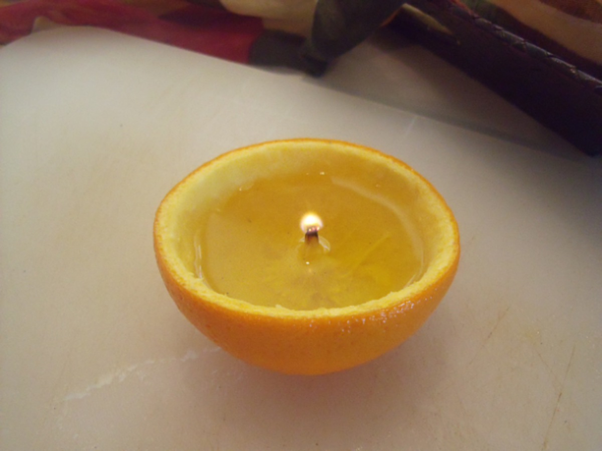 Fill the orange bowl with cooking oil and light the wick with a match  