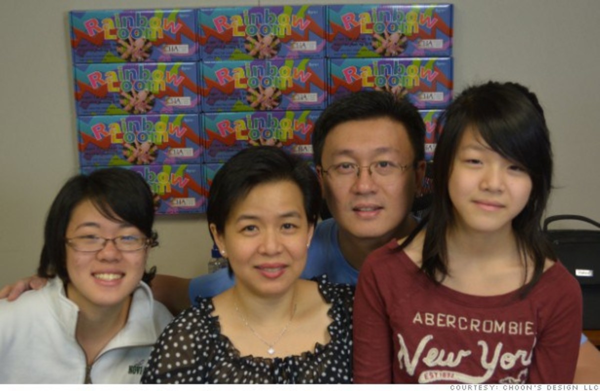 The Creator of Rainbow Loom Poses With His Family In Front of Rainbow Loom Kits
