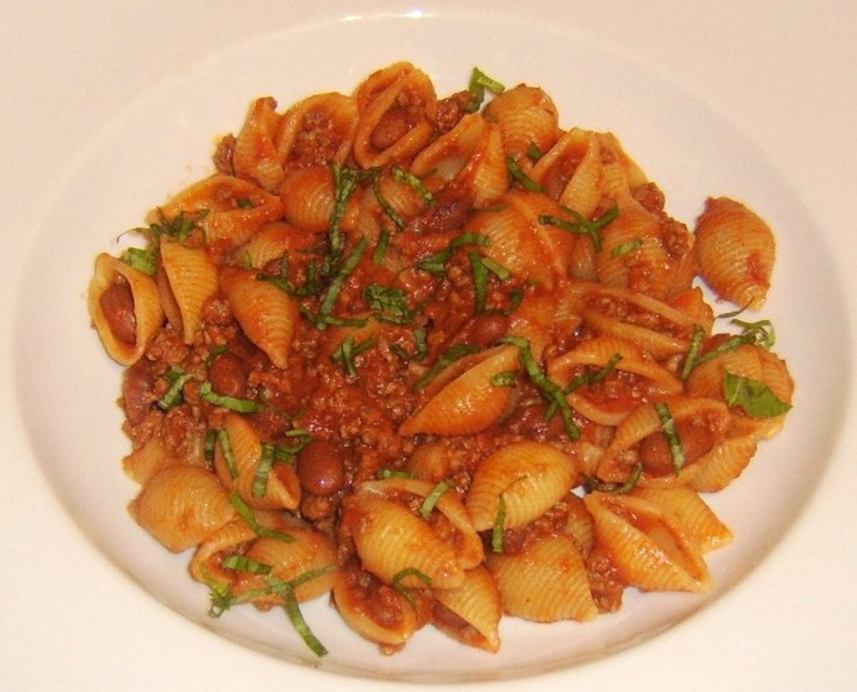 Conchiglie pasta coated in a rich beef and borlotti bean spicy tomato sauce