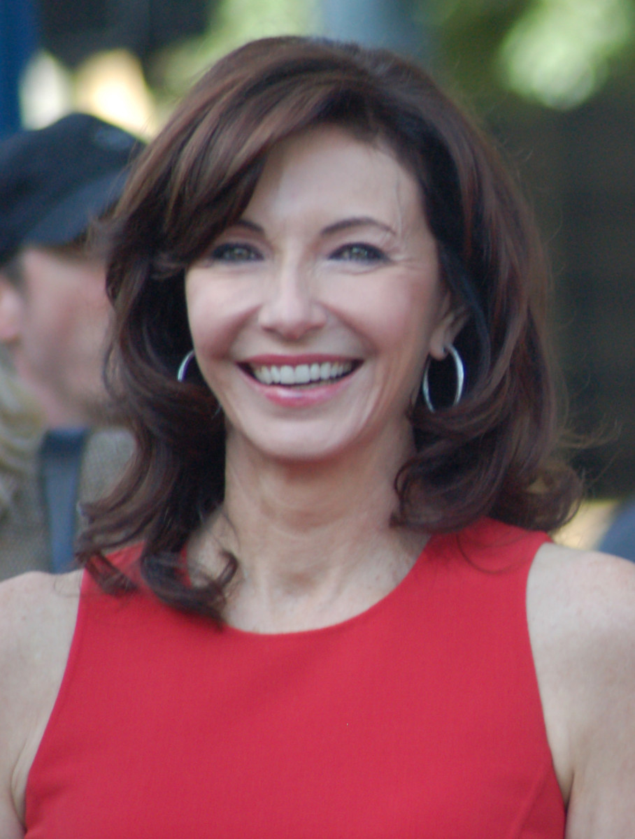 The beautiful Mary Steenburgen with minimal makeup and lovely wavy hair to enhance her natural beauty.