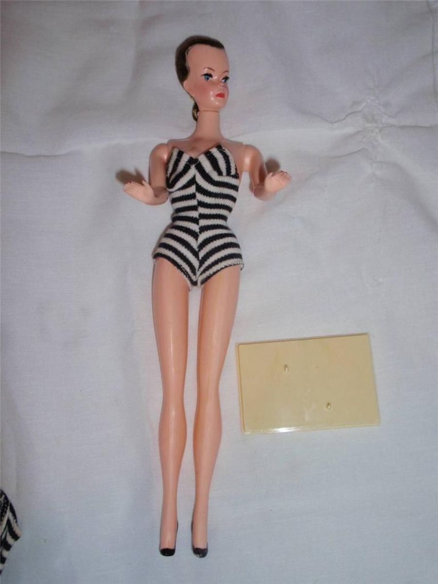 Lilli Doll The German Doll in a white and black swim suit that Inspired Ruth Handler to create Barbie