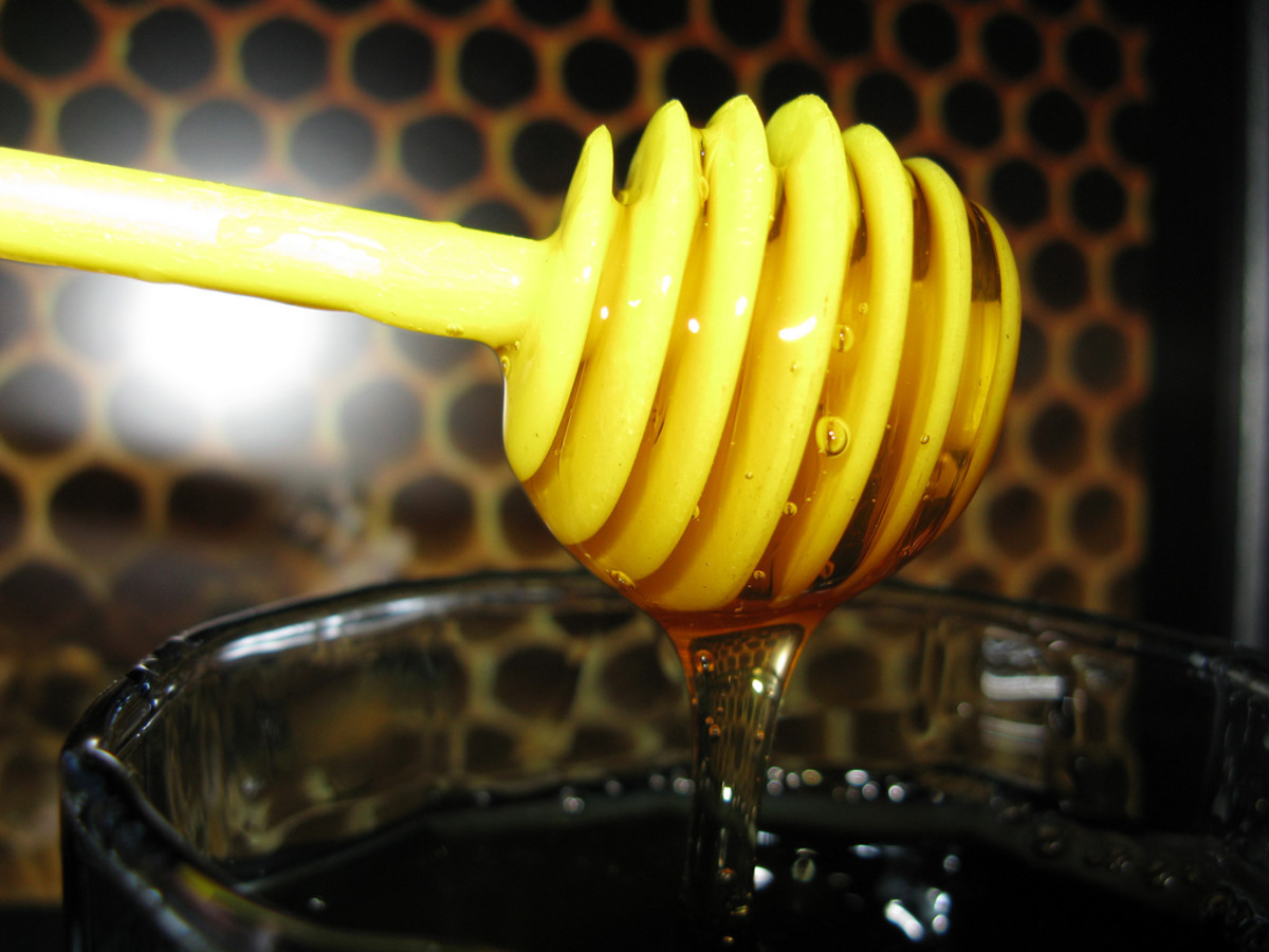 Honey can improve your hair's health and lighten its color at the same time. 