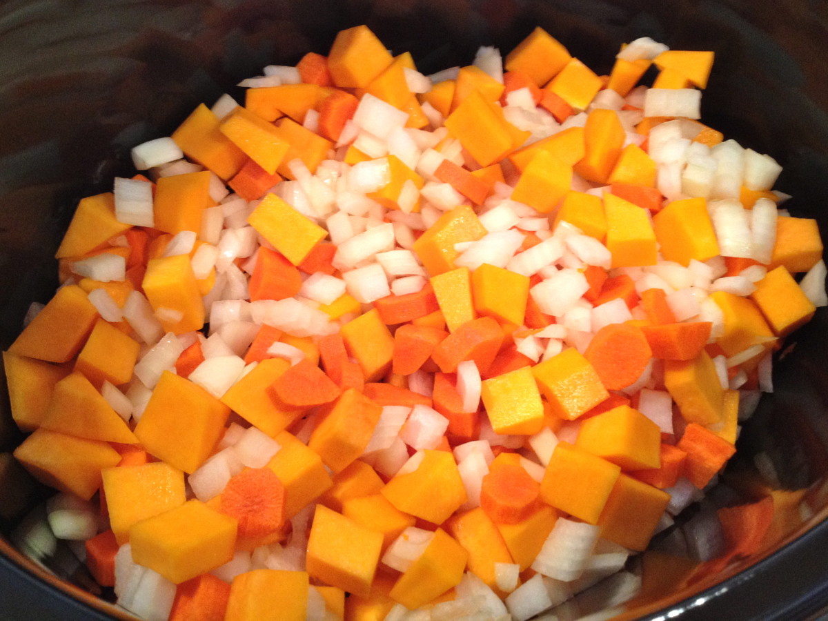 Add diced and chopped vegetables to the slow cooker.