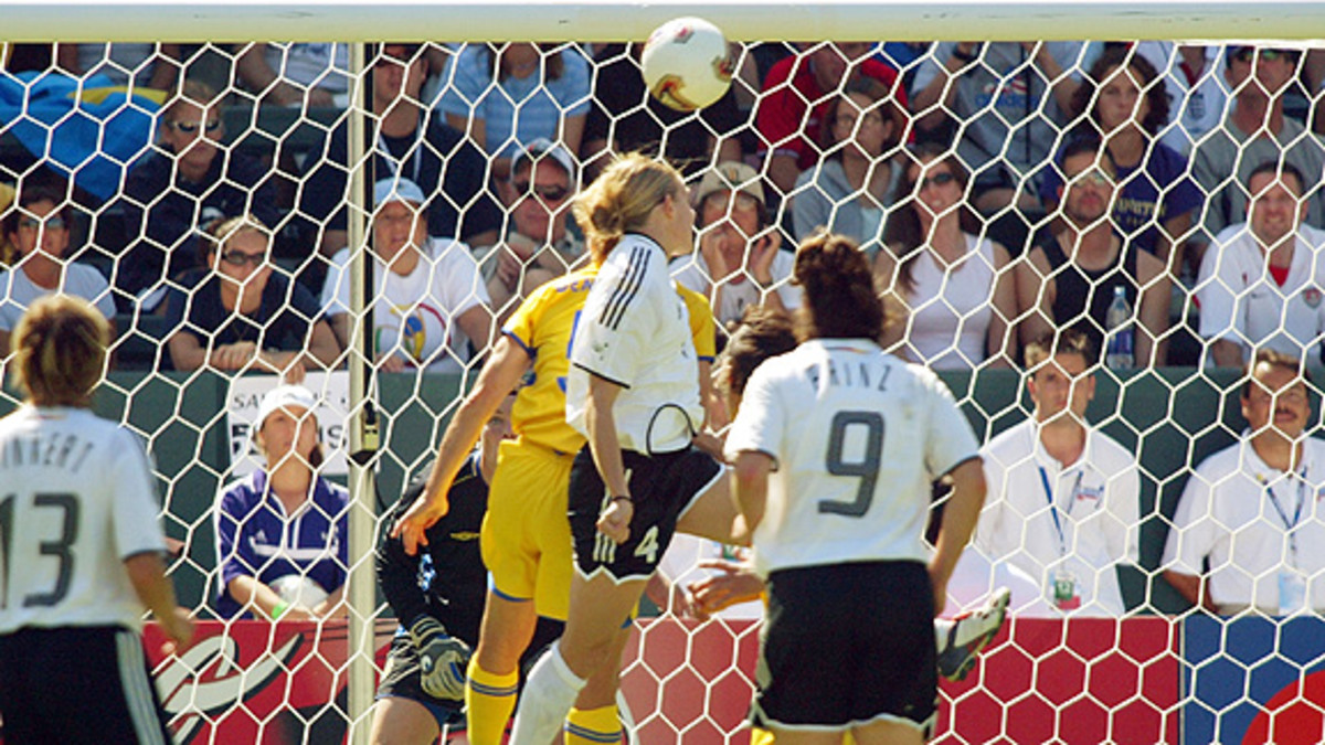 Birgit Prinz (9) of Germany watches at Nia Künzer (4) heads in the winning goal in Germany match against Sweden in the 2003 Women's World Cup final.