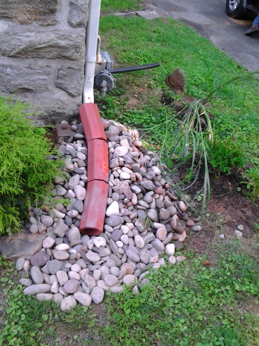 I also extended a downspout to divert water.