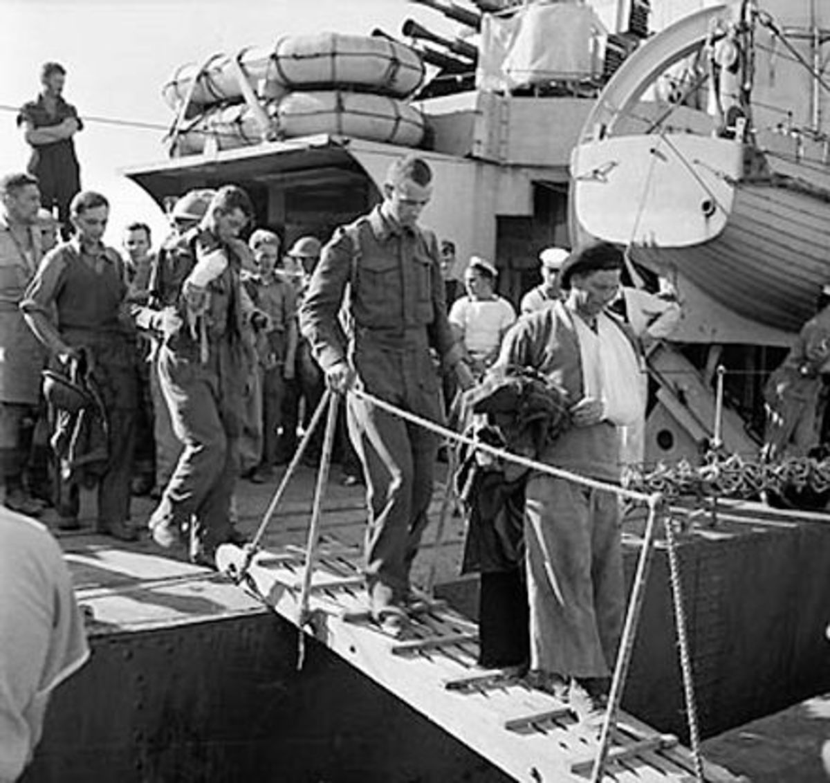 Wounded British troops disembark in Alexandria after being evacuated from Crete at the end of May, 1941