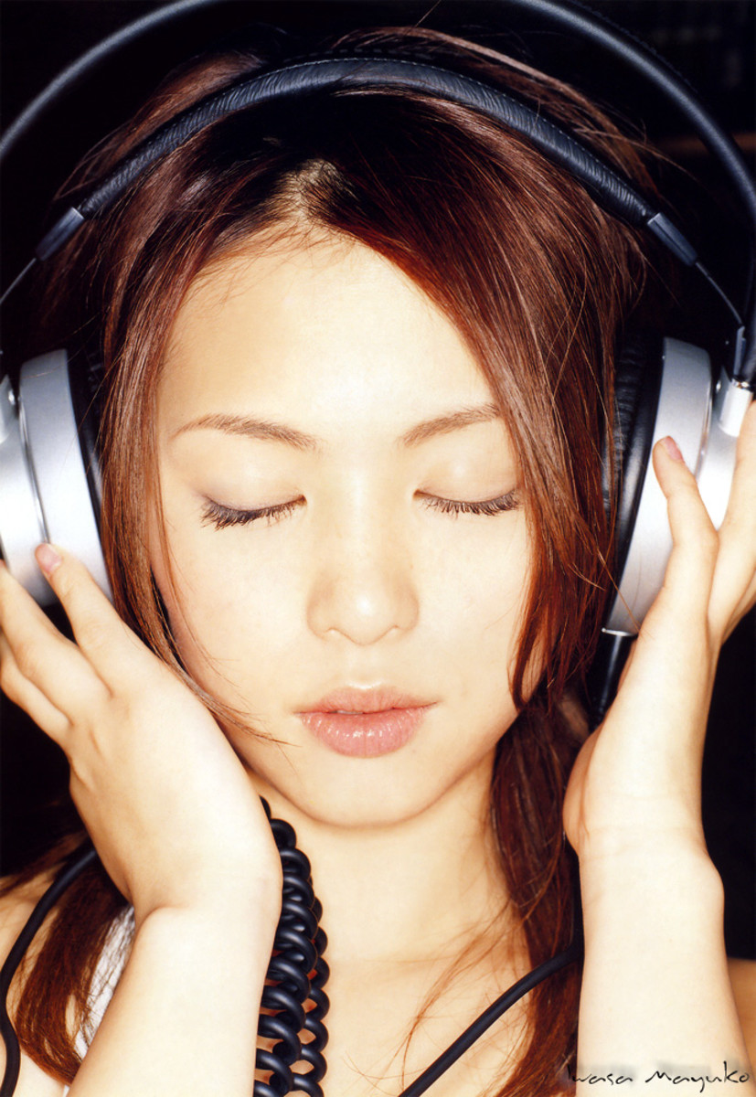 Is Mayuko Iwasa listening to music in this photo?
