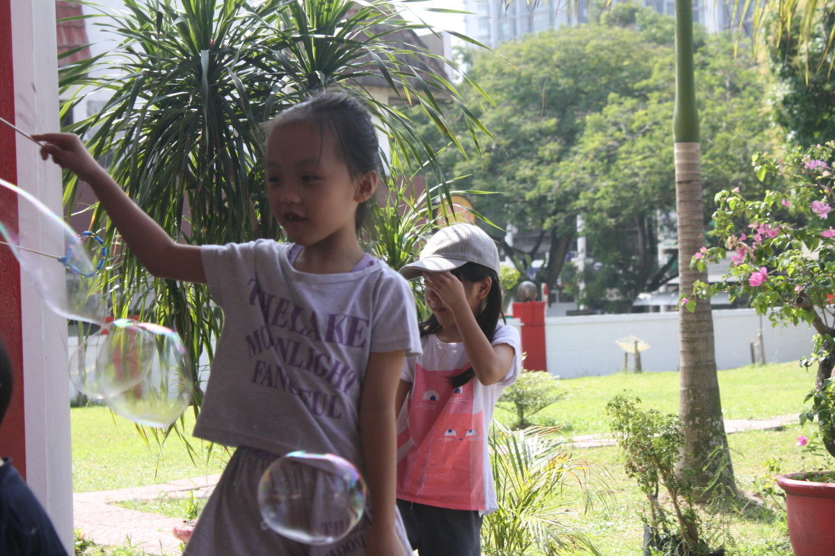 Kids love playing with bubbles.