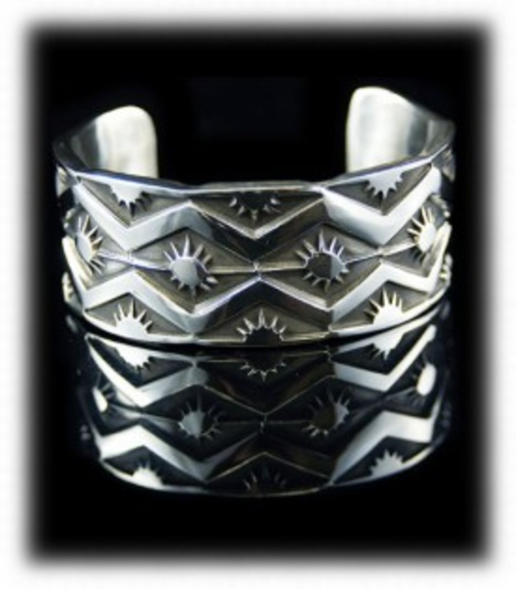Navajo silver cuff bracelet with Navajo stamping and carving before the use of turquoise.