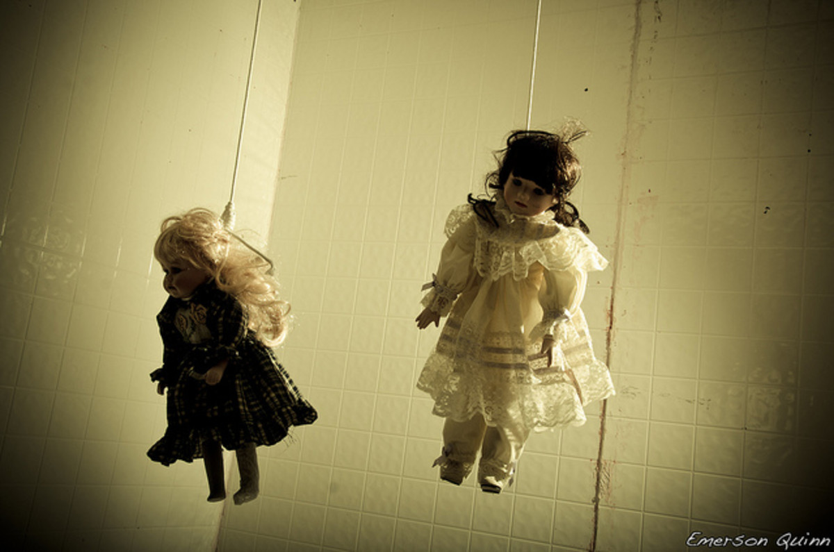 Hanging creepy dolls to freak people out.