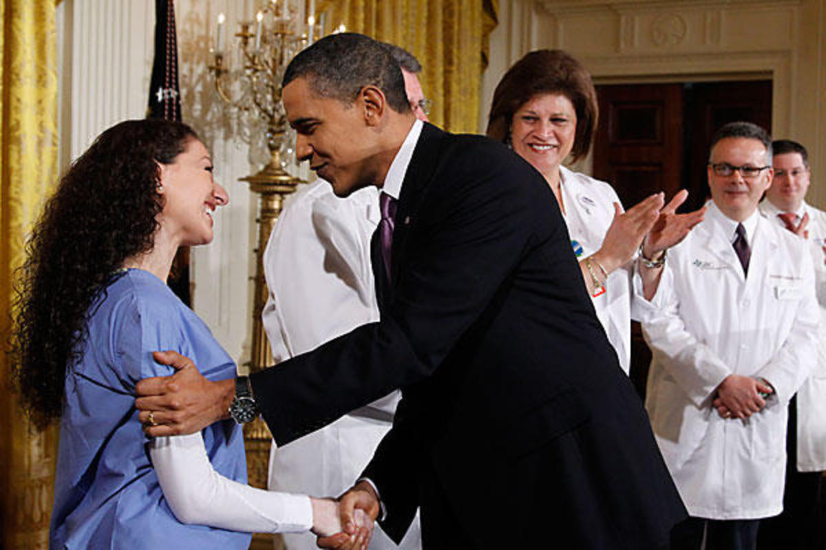 Obama talks and shakes hands of the Health Care workers