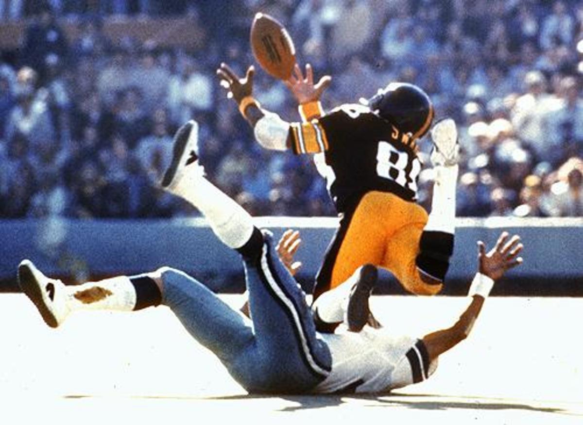 Swann dives as he catches a pass from QB Terry Bradshaw during Super Bowl X in Miami, Fla., on Sunday, Jan. 18, 1976