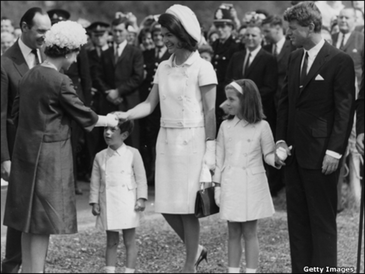photo used for educational purposes from bbc.co.uk The John F. Kennedy Family in Runneymede (JFK Jr, Jackie, Carolyn and Robert Kennedy - JFK's younger brother), greeting Queen Elizabeth (the daughter of the Queen Mother who gave the cross to Jackie)