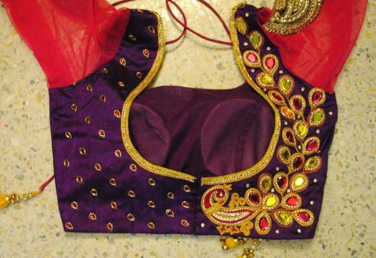 A deep purple with a hot pink traditional choli pattern.