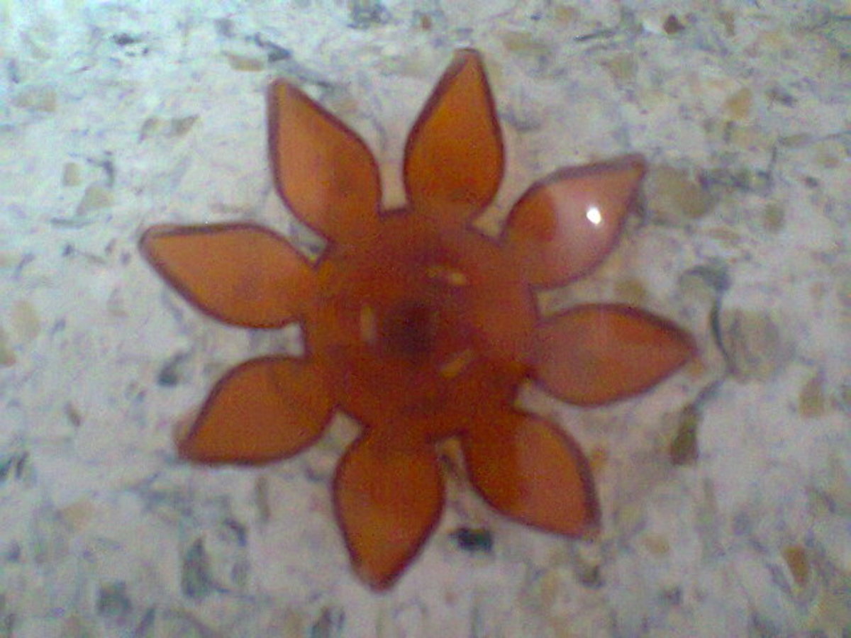 Floating flower for the wick to stand on