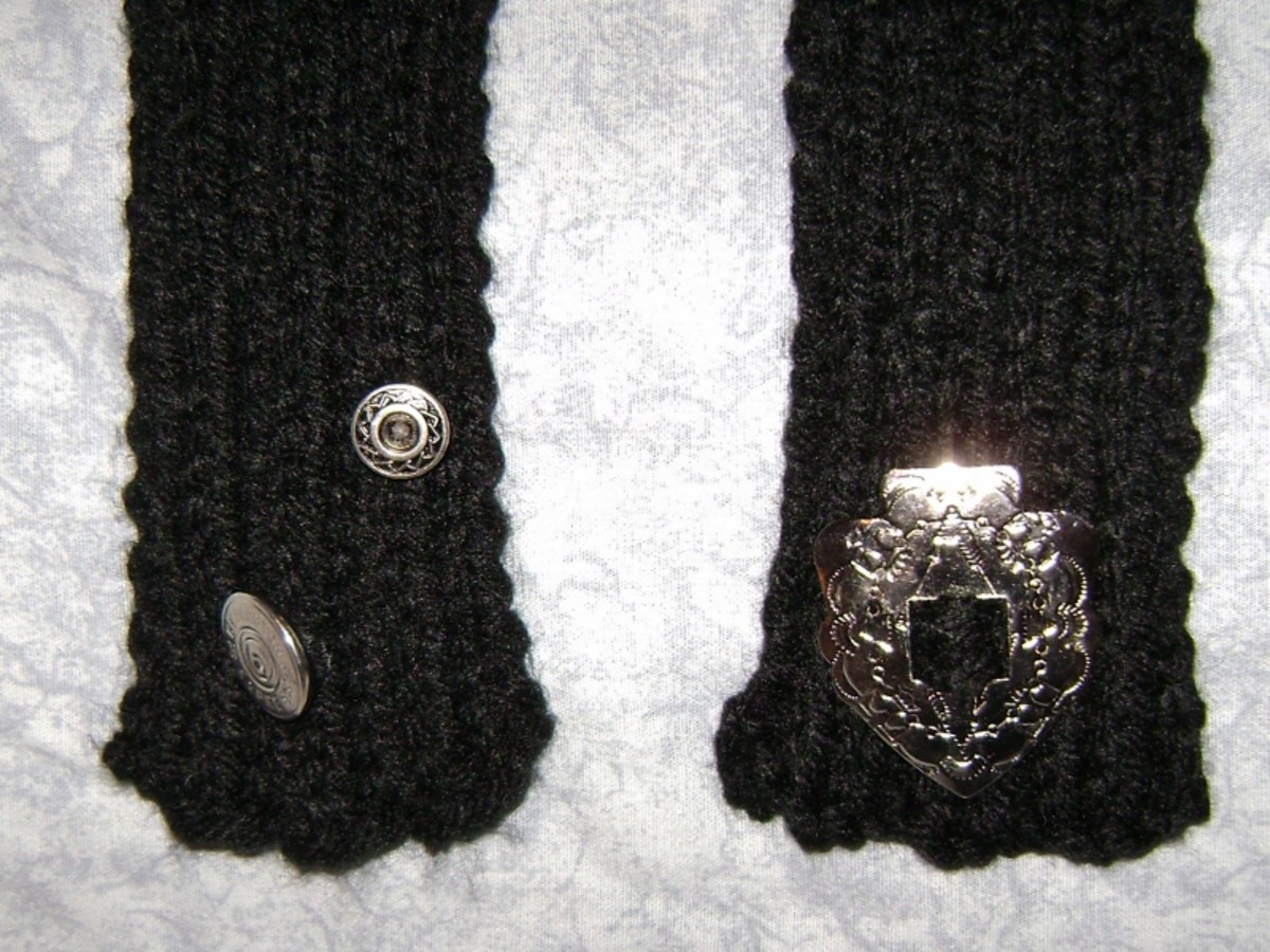 I used some of my silver buttons on this black scarf I knit.