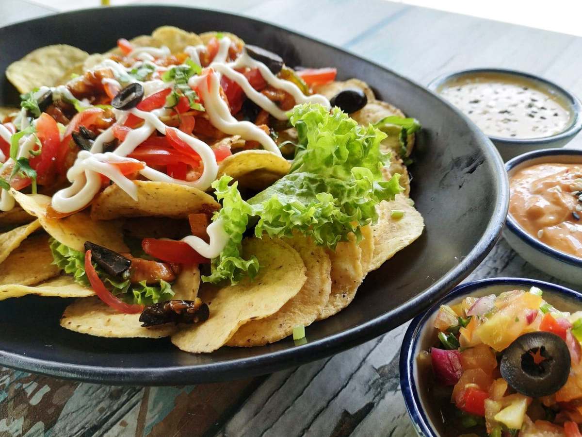 The one common and delicious North American potluck item that we have come across is something called "Haystacks" that is basically a combination of baked beans, corn chips, salsa, various salad veggies, and cheese (dairy or non-dairy).