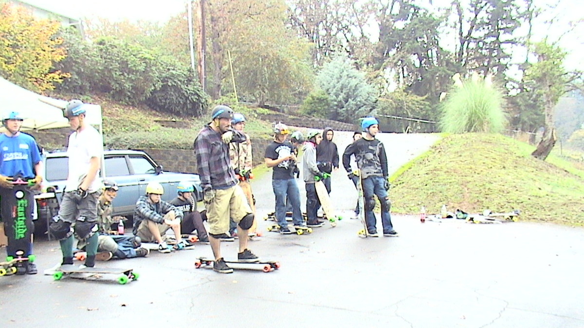 extreme-long-board-skating-competition-on-wet-slope