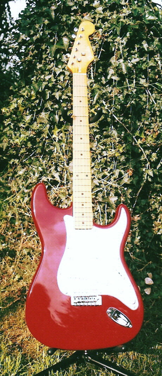 A gleaming cherry-red Stratocaster ... or is it? (Sorry about the poor photo quality.)