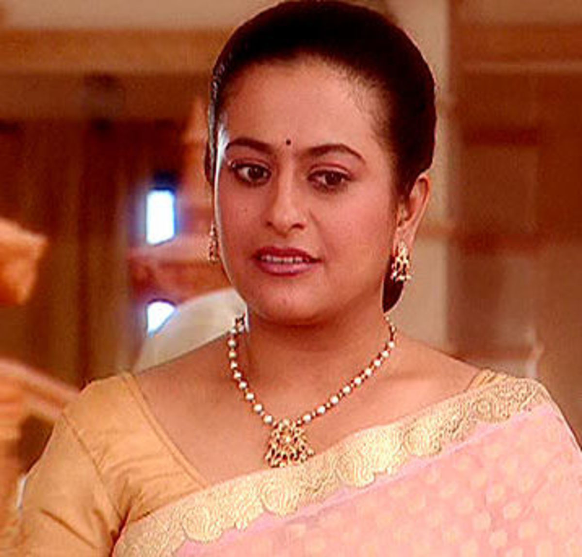 Nikita Anand as Siddharth's widowed Mother Vandhana