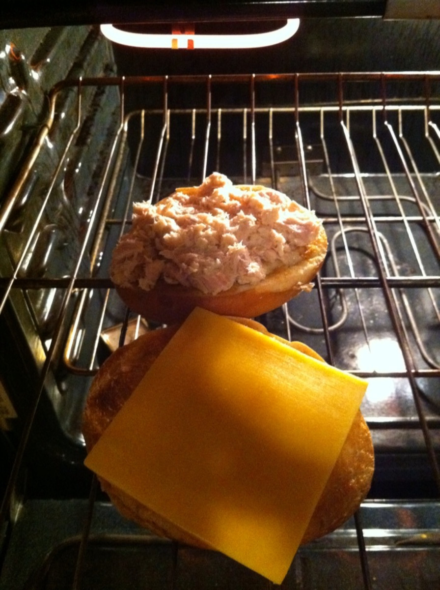 bread with cheese and tuna in the oven on broil